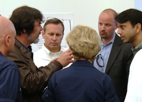 A group of people talking.