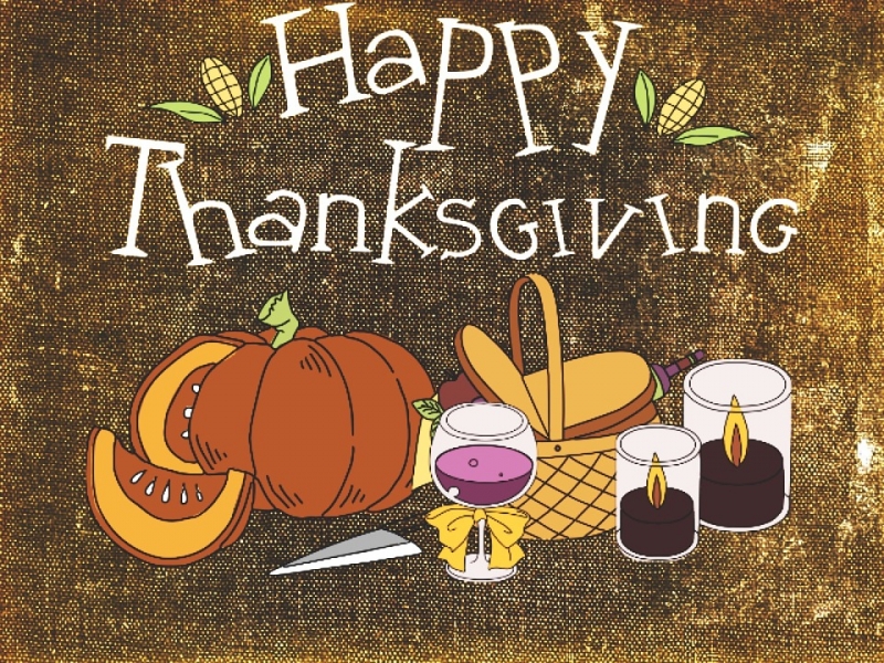 An image that reads "Happy Thanksgiving" with a picnic basket and food.