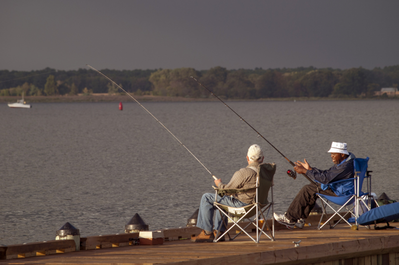 Two people fishing.