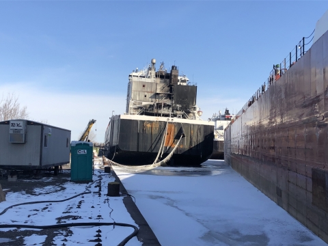 A view of the back of a vessel showing smoke damage. 