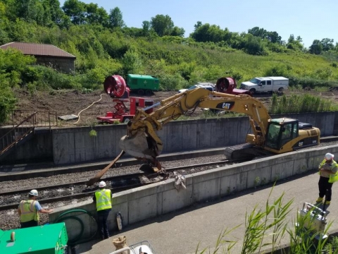 Construction equipment on a rail line. 
