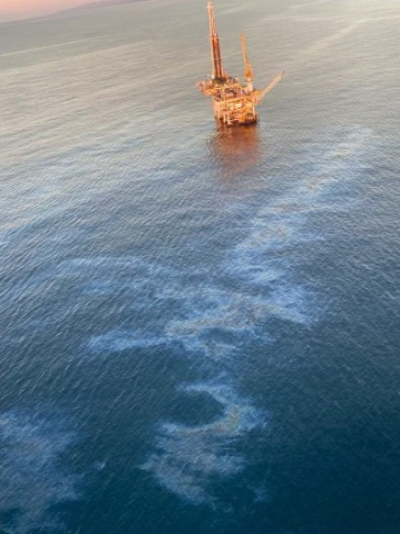 An aerial image of a sheen near a platform.