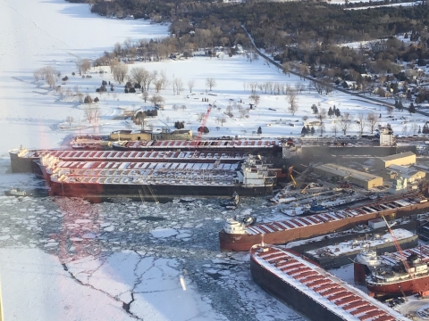 Fire coming from a vessel in icy water. 