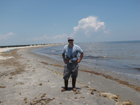 A person on a beach. 