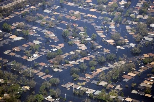An aerial view of a flooded residential area. 