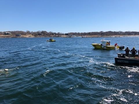 Three vessels in a body of water.