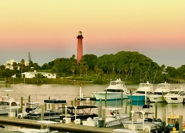A marina with a lighthouse. 
