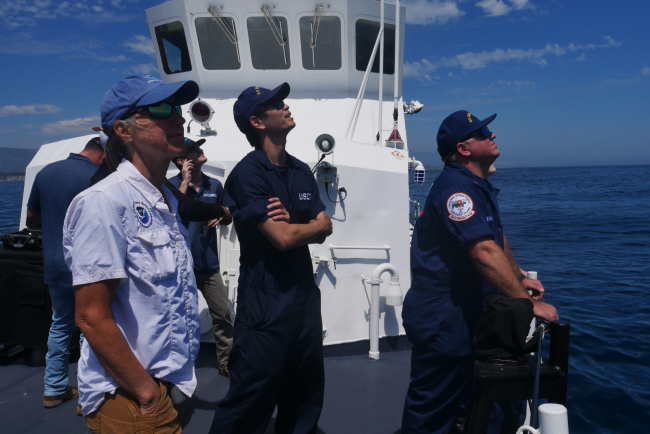 Team of visual observers supporting UAS pilot during flight, ensuring safety and location of UAS technology. 