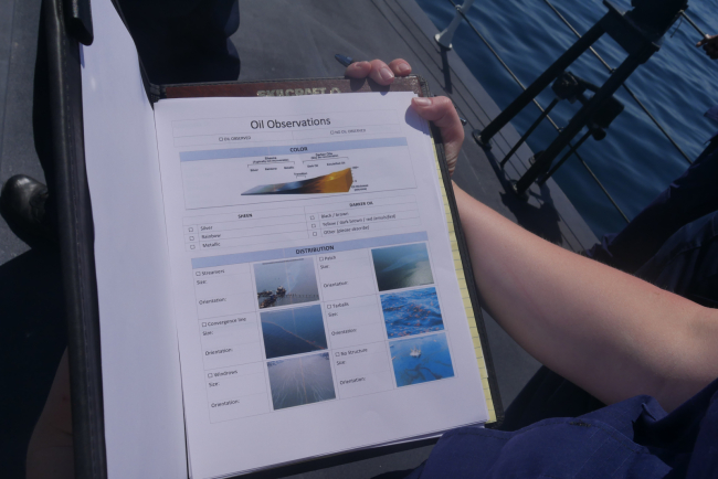 Visual observer notes oil observations during UAS flight. 