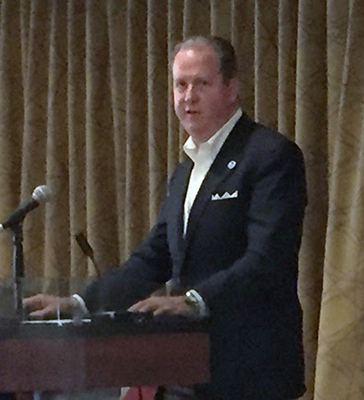 A man at a podium.