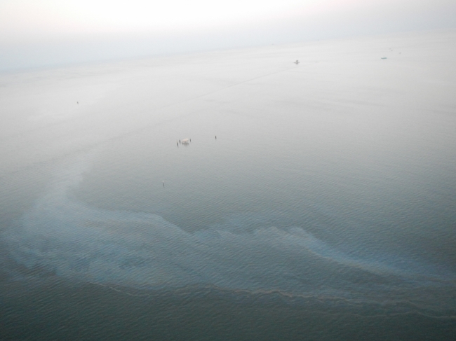 An oil sheen on water. 