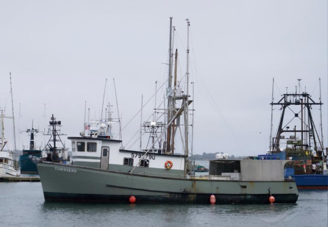 A vessel in a marina.