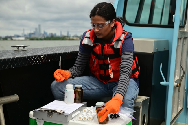 Woman testing water samples.