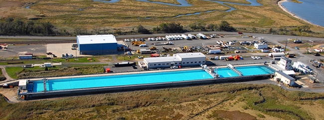 An aerial shot of a large test tank. 