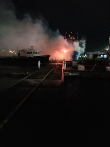 A vessel on fire.