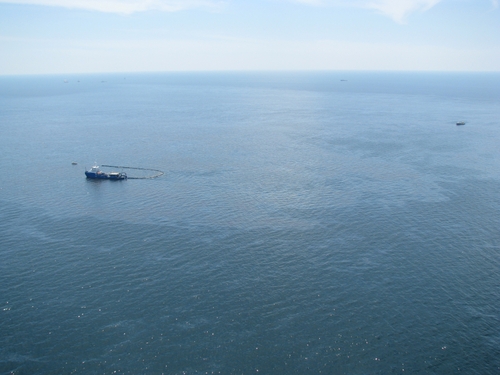 A response vessel in an oil sheen.