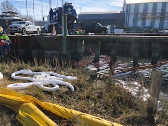 Pollution boom on the shore. 