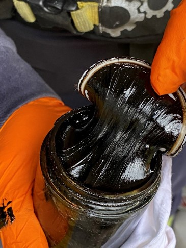 A jar of oil.