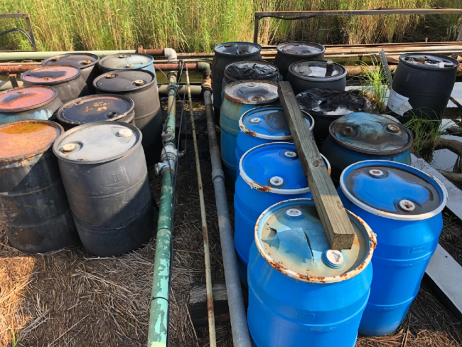 Chemical storage bins.
