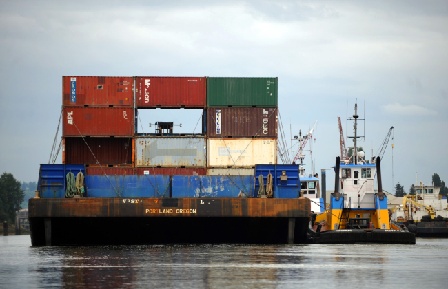 A barge with shipping containers.