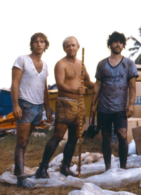 Three people posing for a photo. 