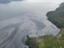 Overflight showing diesel leaking from a fishing vessel that ran aground in an Alaskan bay.