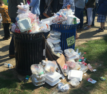 Two overflowing trash cans.