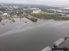 An aerial view of an oil sheen along a shoreline.