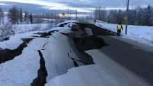Earthquake damage — a crack in a road.