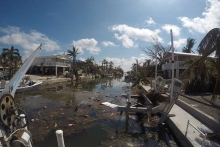 A body of water with hurricane debris around it. 
