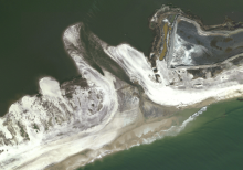 An aerial image of a shoreline.