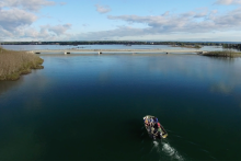 A boat on a body of water.