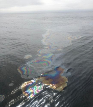An oil sheen in water.