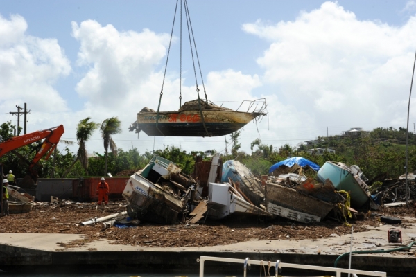 A vessel being lifted up by a crane. 