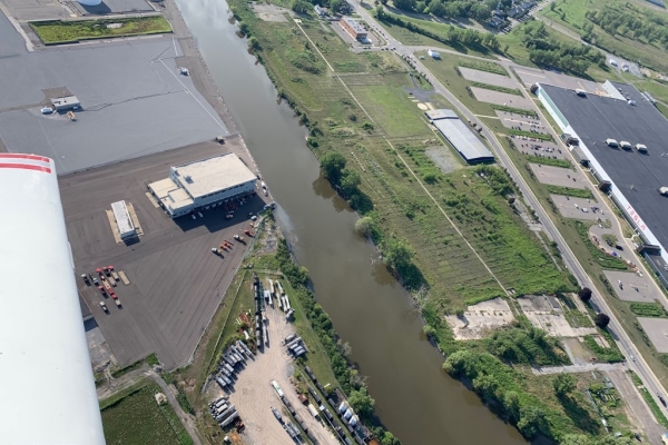 An aerial view of an urban waterway.