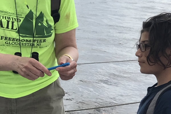 Instructor talking with student.