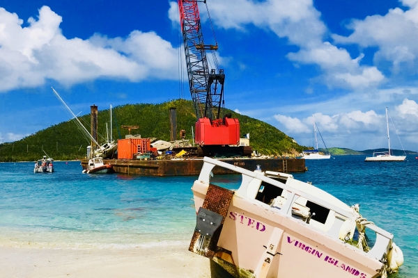 A grounded vessel on a beach. 