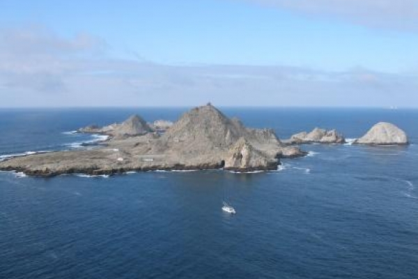 An aerial view of a rocky island. 